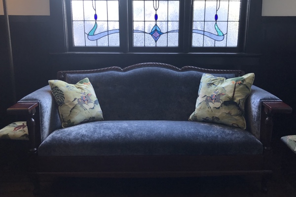 Sunlit Sydney room with shimmering velvet upholstery